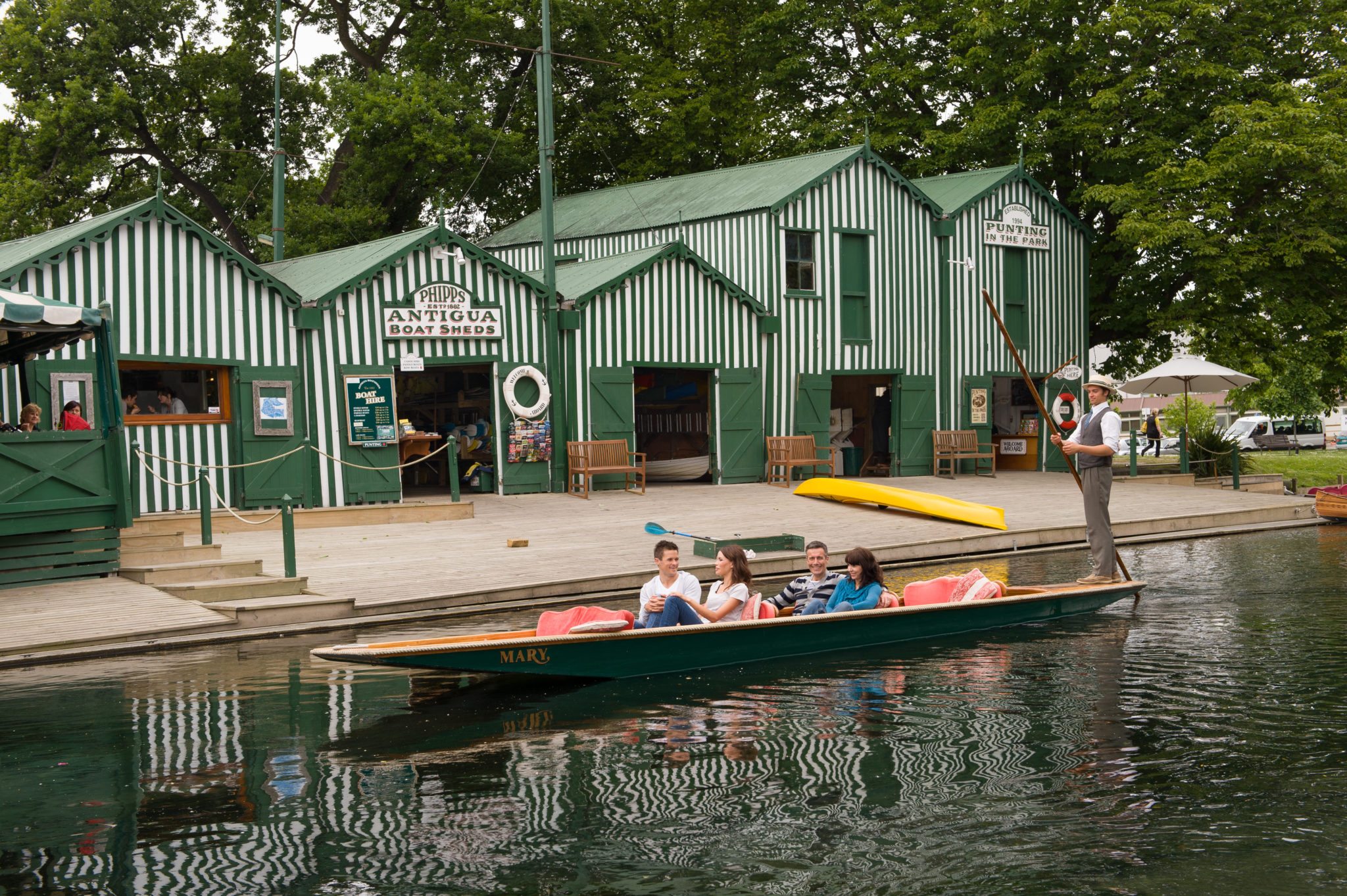 friends_enjoying_a_spring_punt_outside_antigua_boatsheds