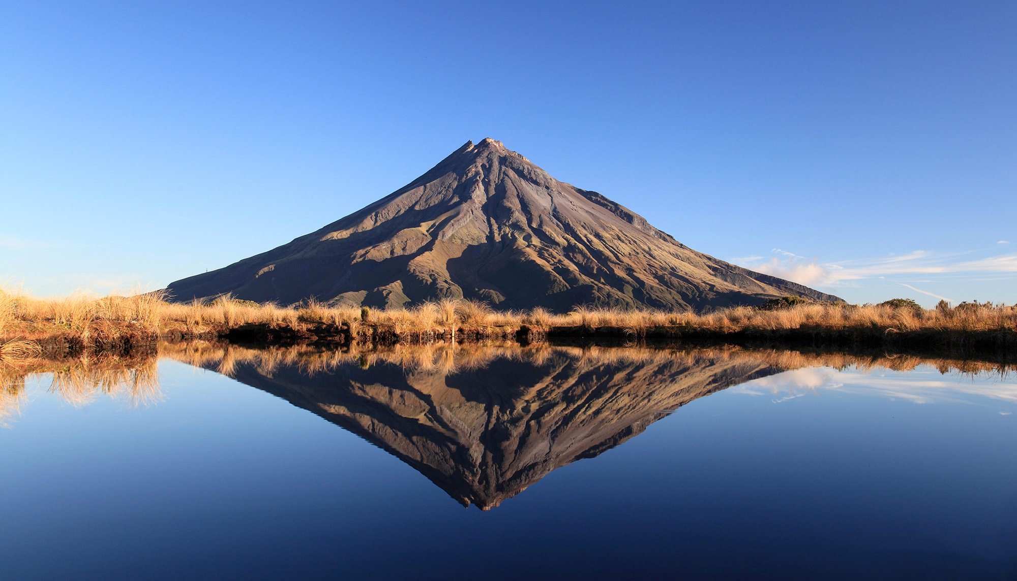 taranaki-pouakai-crossing-mt-taranaki-reflected-in-pouakai-tarns-jeremy-beckers