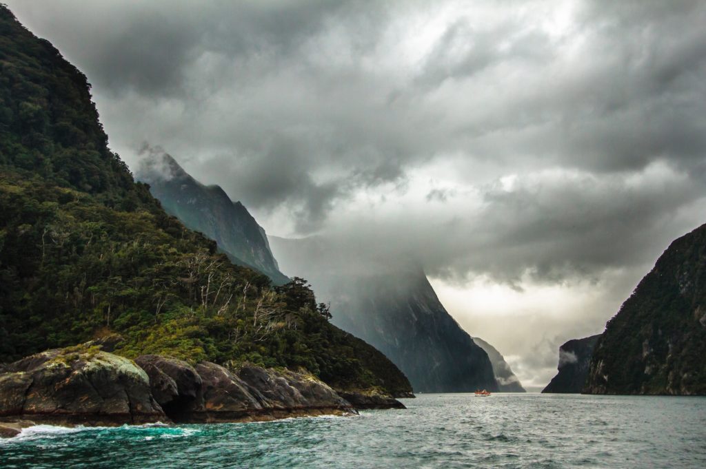 A dark and stormy Milford Sound from the water